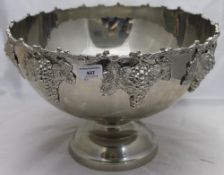 A grapevine decorated plated punch bowl