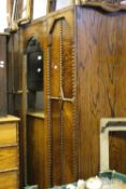 An early 20th century oak wardrobe