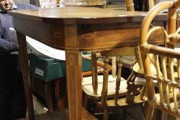 A 19th century mahogany demi lune side table