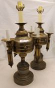A pair of brass lamps