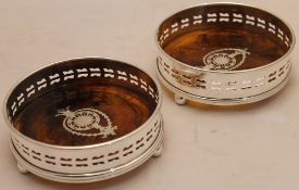 A pair of plated coasters