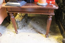 A teak dining table