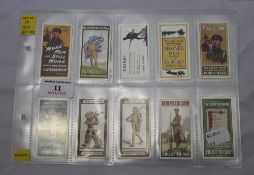A set of twelve Wills's recruiting posters cigarette cards