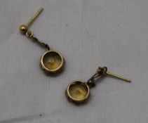 A pair of citrine earrings