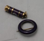 An enamel and yellow metal pencil and a similar brooch