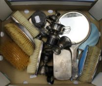 A quantity of small silver trophy cups and silver backed dressing table pieces,