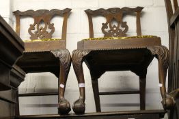 A pair of late 18th/early 19th century mahogany dining chairs