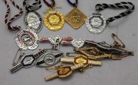 A quantity of vintage race meet badges