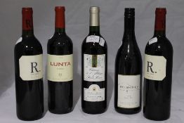 Five various bottles of red wine
