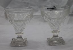 A pair of 19th century engraved glass rummers
