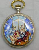 A silver pocket watch depicting an erotic scene