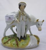 A 19th century Staffordshire figural cow group