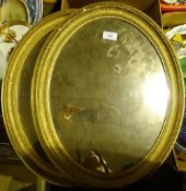 Two Victorian gilt framed oval wall mirrors