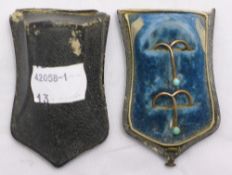 A boxed pair of turquoise clips