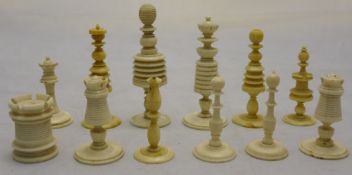 A quantity of carved ivory chess pieces