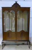 An Edwardian mahogany glazed display cabinet
