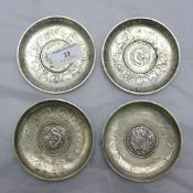 Four Chinese coin dishes