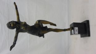 A Deco style bronze figure of a girl