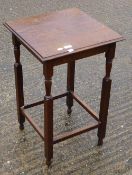 An early 20th century oak side table