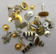 A quantity of cufflinks and studs including gold studs