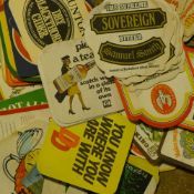 A collection of vintage beer mats