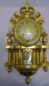 A gilt wood Cartel clock