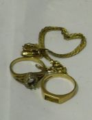 Two 9 ct gold rings and a 9 ct gold bracelet