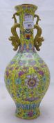 A Chinese porcelain yellow ground vase