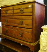 An Edwardian chest of drawers and chiffonier back