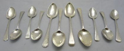 Seven 18th/19th century silver teaspoons together with four George III silver spoons,