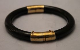 A Deco style black bangle