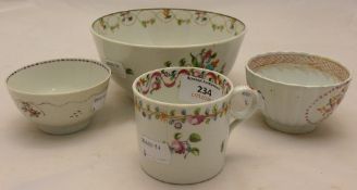 A 19th century porcelain bowl with two tea bowls and a cup
