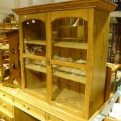 A Victorian pine glazed cupboard