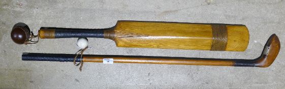 A golf club and cricket bat