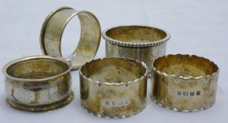 Five various silver napkin rings