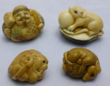 Four carved netsuke