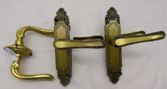 Three pairs of brass handles