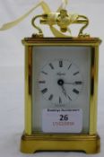 A brass cased carriage clock