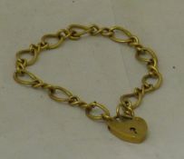 A 9 ct gold locket and chain