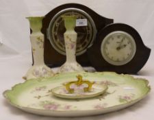 Two electric clocks and a dressing table set