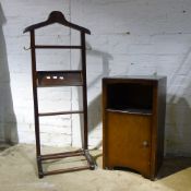 A walnut bedside cabinet and a clothes horse