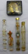 A small quantity of glass scent bottles and a lacquered stamp box