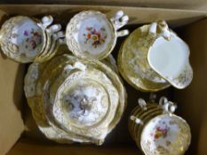 A Victorian gilt and florally decorated tea set