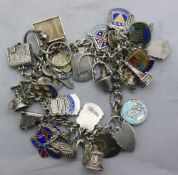 A silver and enamel charm bracelet