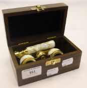 A boxed pair of opera glasses