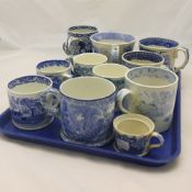 A quantity of 19th century blue and white mugs,