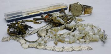A small quantity of jewellery including a bracelet inscribed with the Ten Commandments