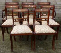 A set of eight brass inlaid dining chairs