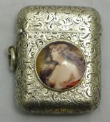 A silver vesta depicting a nude woman