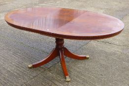 A brass inlaid dining table